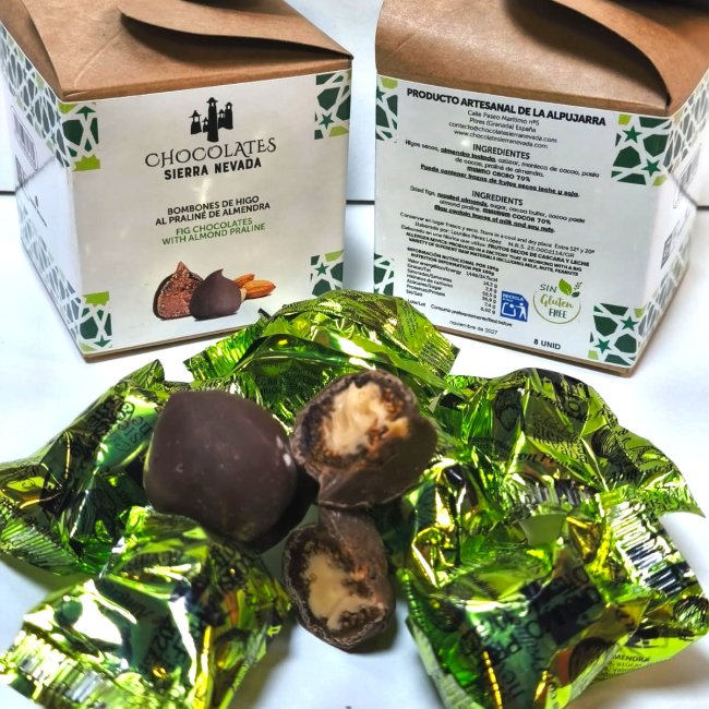 Bombón de higo relleno de praliné bañado en chocolate con leche granel  0.2 kg